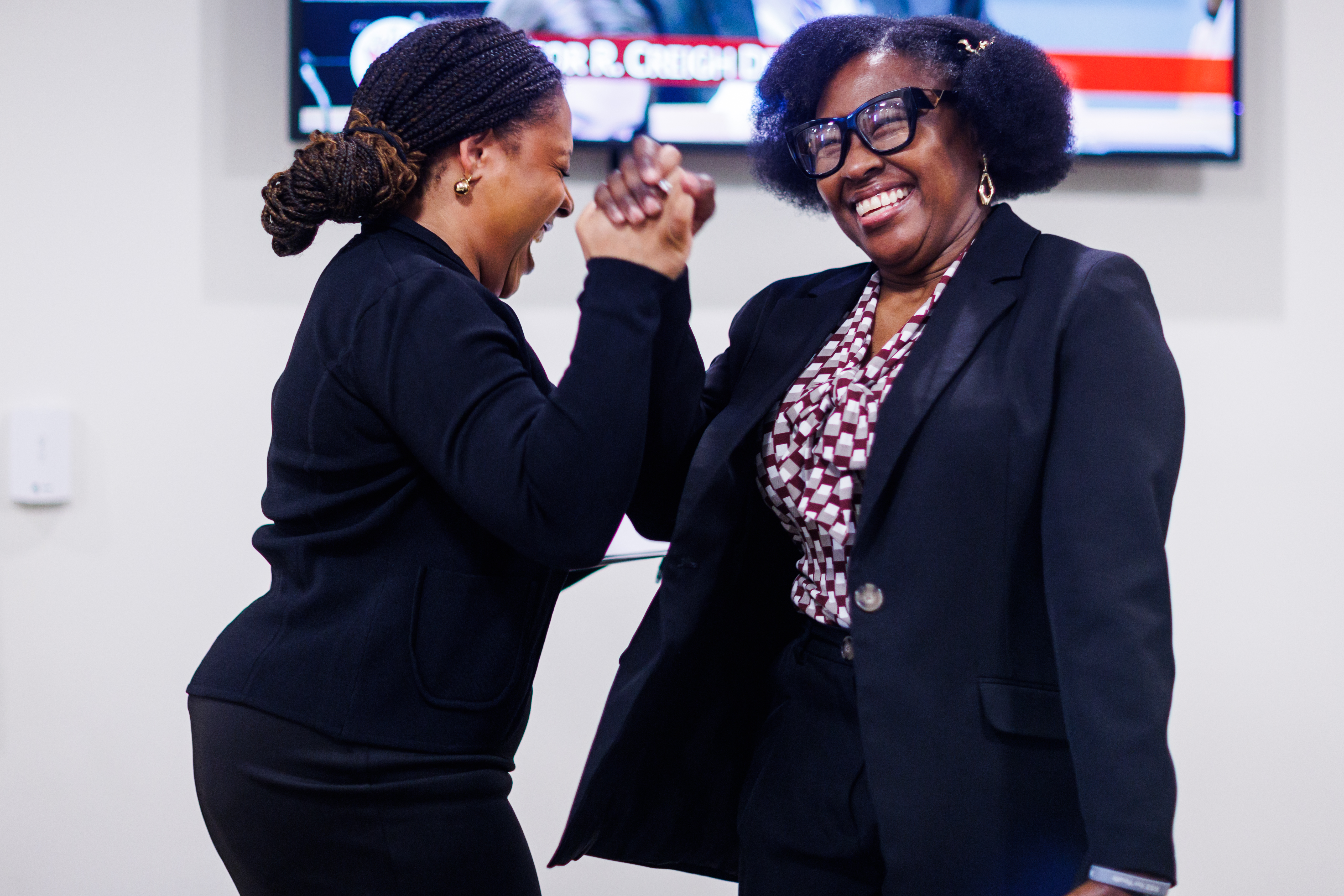 Scenes from the Virginia State Capitol 2026: a dispatch 13 Del. Destiny LeVere Bolling (left), D–Henrico, celebrates with Valerie Slater, executive director of RISE for Youth, after her bill passed the Senate Finance and Appropriations Committee on Monday, March 9, 2026 at the General Assembly Building in Richmond, Virginia.