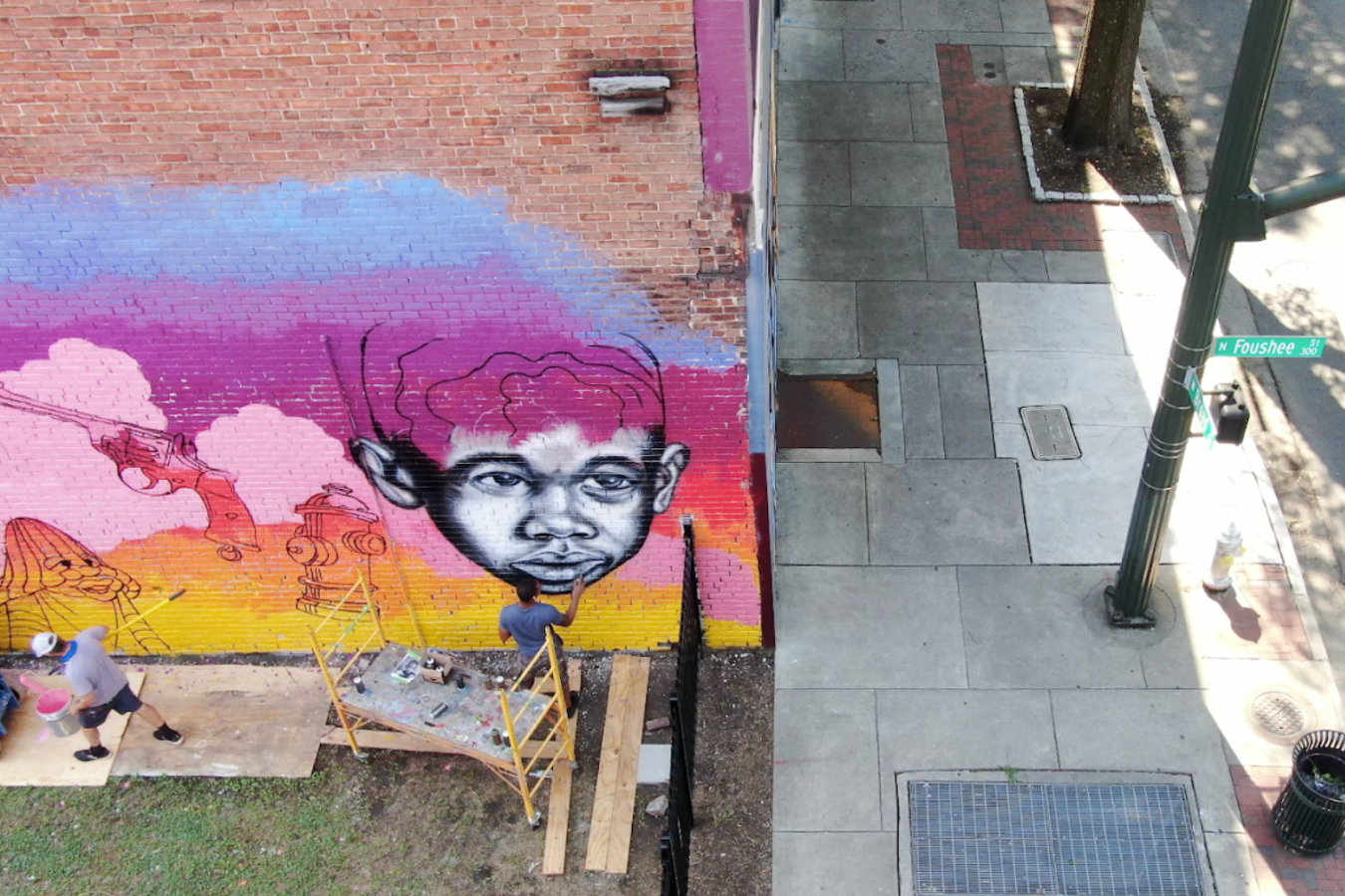 “We Need to Talk About…”: Richmond Artist Sparks Conversations on Racial Equity With Public Art 2 Hamilton Glass and Matt Lively worked together on “In Conversation” on West Broad Street. (Photo from Mending Walls RVA Mural Project)
