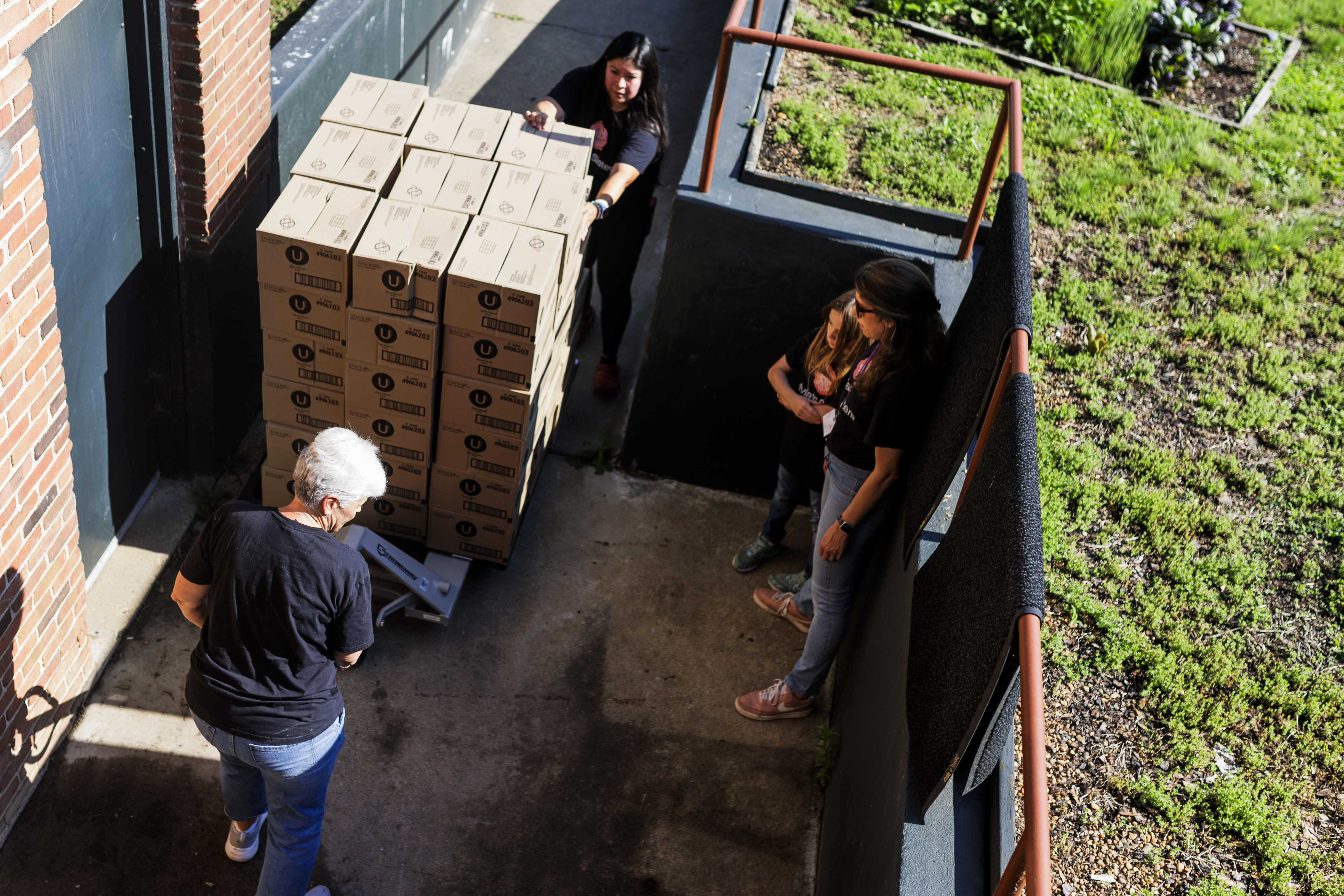 Spanberger higher ed board veto, drought conditions and the 'gun show loophole' 1 Brittany Averette (right), executive director of Sylvia’s Sisters, watches with Caroline Treanor, 11, as Mila Spaulding and Mimi Isaac move a pallet full of recently donated menstrual health products on Thursday, May 28, 2026 in Richmond, Virginia.