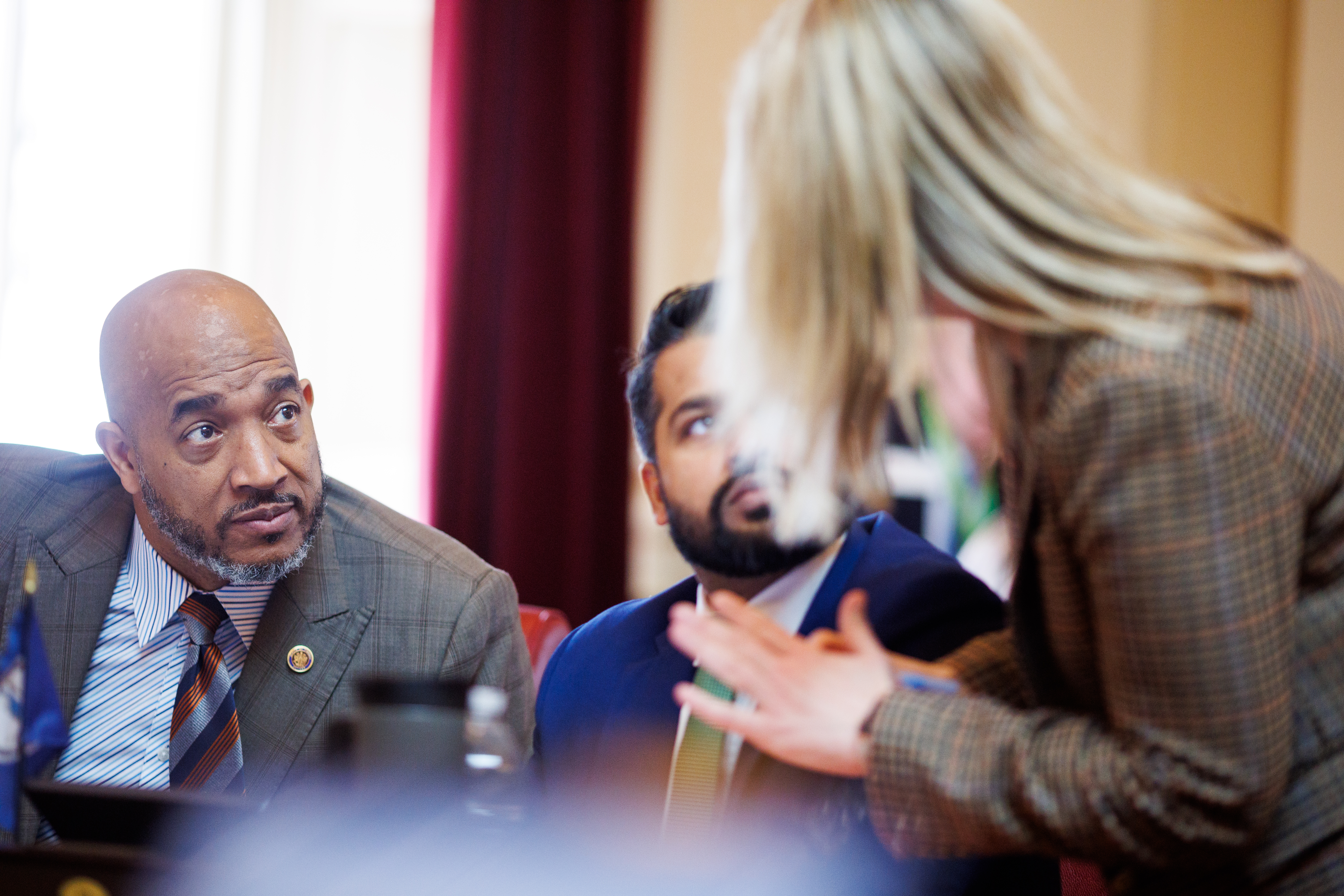 State Sens. (from left) Mike Jones, D–Richmond; Saddam Salim, D–Fairfax; and Russet Perry, D–Loudoun, talk during a General Assembly Session on Monday, February 16, 2026 at the Virginia State Capitol in Richmond, Virginia.
