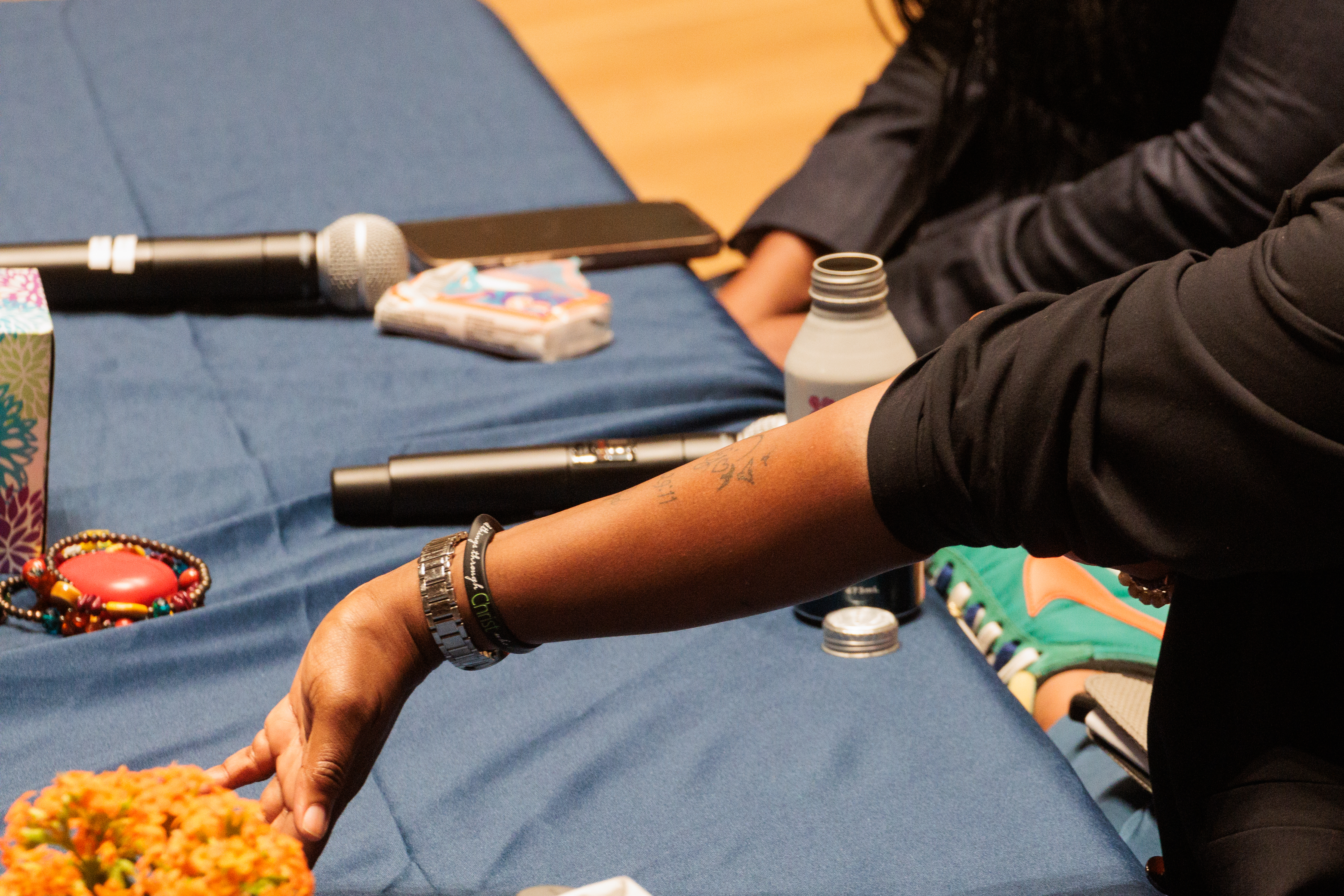 UVA community gathers for panel on healing to mark one year after shooting 1 Tracy Walls shows a tattoo she got in honor of her son, Edgar, on Nov. 13 in Charlottesville.