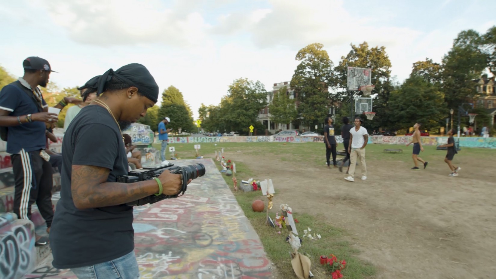 “Why This Moment” captures Richmond’s frustrations over police brutality. Watch the film Thursday, Sept. 30 on VPM PBS 1 Filmmaker Domico Phillips captures an afternoon of activity as Richmonders enjoy the grassy area around the Lee monument. Protestors unofficially renamed the area “Marcus-David Peters Circle” in memory of a 24-year-old Black man shot and killed by a Richmond police officer in 2018. (Photo provided by VPM)