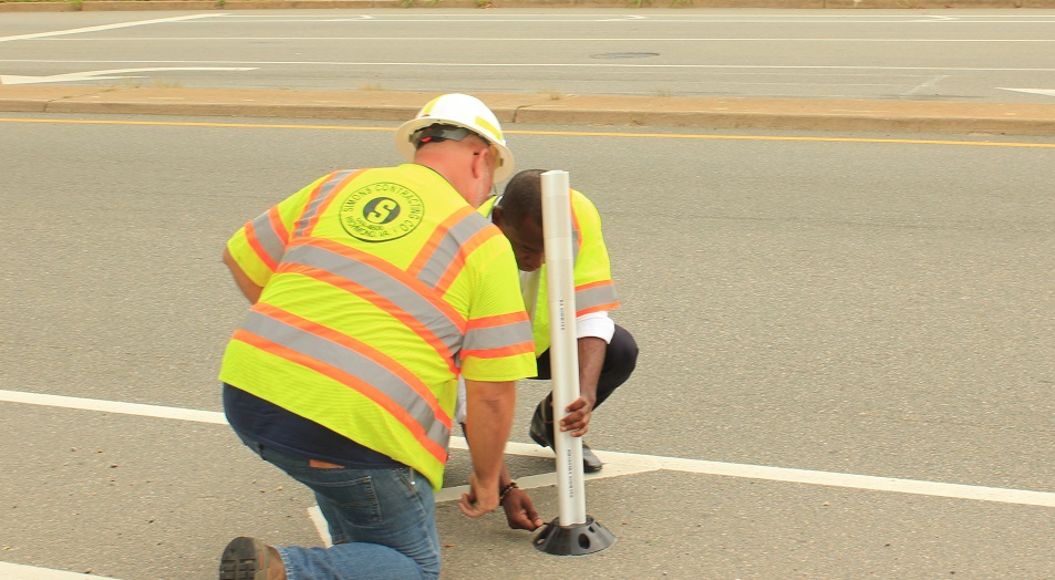 New Bike Lane Gets An Upgrade 1 Mayor Stoney inserts a buffer called a flexible delineator. (Photo: Ian Stewart/VPM News)