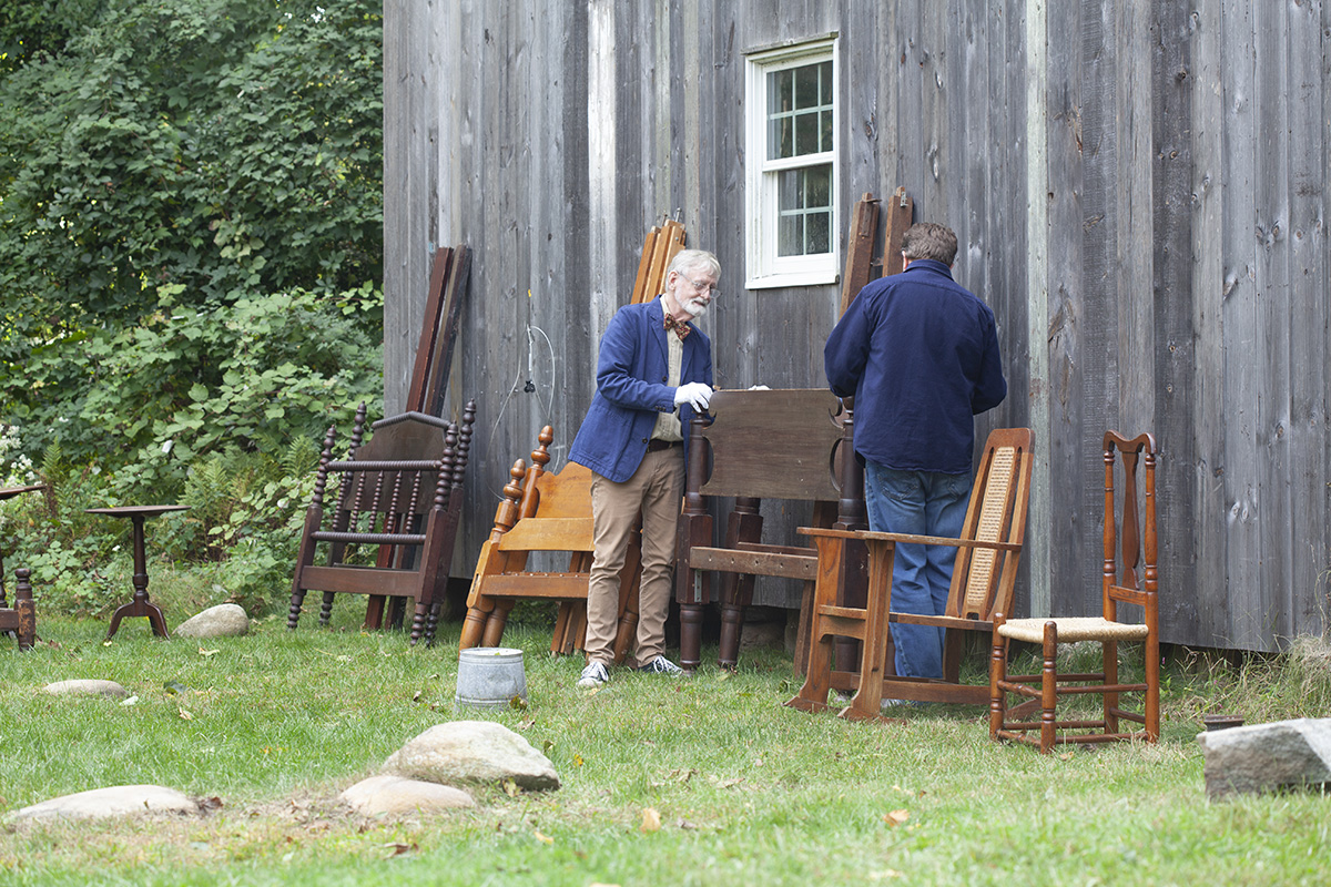 Legacy List Transforms a Venerable Family House into a Place that Feels Like Home 3 Matt and a local furniture expert examine Bess Rattray's antique beds stored in her barn.